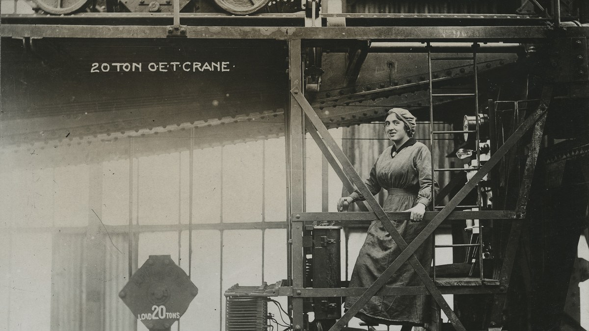 Worker operating a 20-ton electric overhead traveling crane